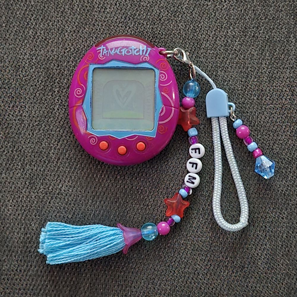 Tamagotchi Connection V1 Magenta Swirls